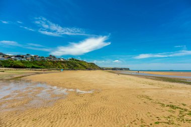 Beach walk on the beautiful Gold Beach off the coast of Ver-sur-Mer - Normandy - France