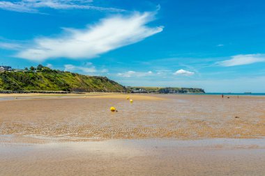 Beach walk on the beautiful Gold Beach off the coast of Ver-sur-Mer - Normandy - France