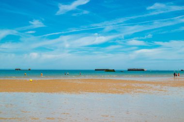 Beach walk on the beautiful Gold Beach off the coast of Ver-sur-Mer - Normandy - France