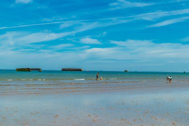 Beach walk on the beautiful Gold Beach off the coast of Ver-sur-Mer - Normandy - France