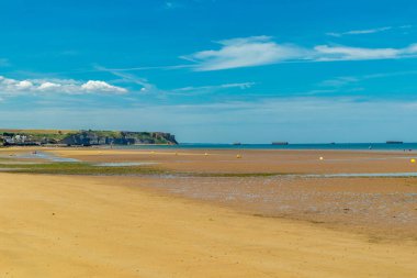 Beach walk on the beautiful Gold Beach off the coast of Ver-sur-Mer - Normandy - France