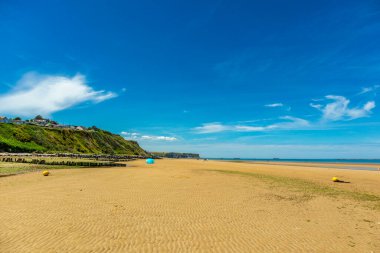 Beach walk on the beautiful Gold Beach off the coast of Ver-sur-Mer - Normandy - France