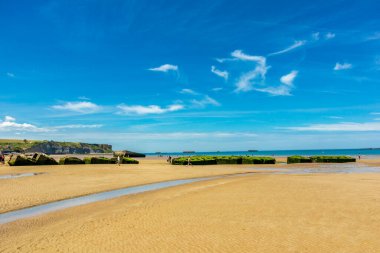 Beach walk on the beautiful Gold Beach off the coast of Ver-sur-Mer - Normandy - France