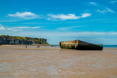 Beach walk on the beautiful Gold Beach off the coast of Ver-sur-Mer - Normandy - France