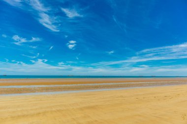 Beach walk on the beautiful Gold Beach off the coast of Ver-sur-Mer - Normandy - France