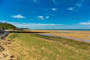Beach walk on the beautiful Gold Beach off the coast of Ver-sur-Mer - Normandy - France