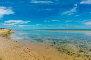 Beach walk on the beautiful Gold Beach off the coast of Ver-sur-Mer - Normandy - France
