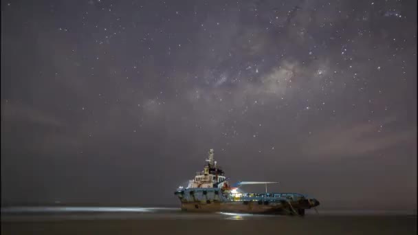 Timelapse Footage Stranded Boat Shore Low Tide Milky Way Galaxy — Stock Video