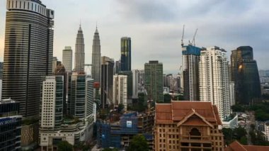 KUALA LUMPUR, MALAYSIA - Oct 10, 2018: Timelapse 4k UHD footage of cityscape of Kuala Lumpur and moving cloud and sunset