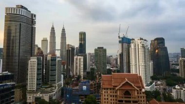 KUALA LUMPUR, MALAYSIA - Oct 10, 2018: Timelapse 4k UHD footage of cityscape of Kuala Lumpur and moving cloud and sunset
