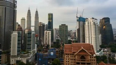 KUALA LUMPUR, MALAYSIA - Oct 10, 2018: Timelapse 4k UHD footage of cityscape of Kuala Lumpur and moving cloud and sunset