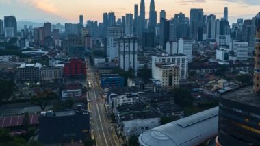 KUALA LUMPUR, MALAYSIA - Dec 21, 2018: Timelapse 4k UHD footage of cityscape of Kuala Lumpur during sunrise