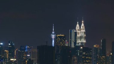 Kuala Lumpur, Malaysia - July 23, 2022 - Timelapse 4k UHD footage of cityscape of Kuala Lumpur at night and city light time-lapse