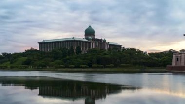 Kuala Lumpur, Malaysia - July 30, 2022 - Time-lapse 4k UHD footage of Prime Minister Office at Putrajaya during sunrise and cloudy day
