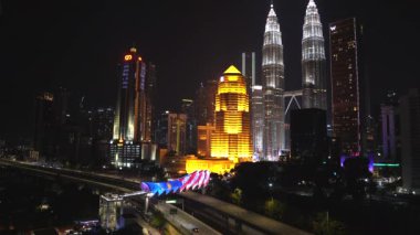 KUALA LUMPUR, MALAYSIA, August 13, 2022 : realtime footage of a pedestrian bridge named Lintasan Saloma near Kuala Lumpur Petronas Twin Tower (KLCC)