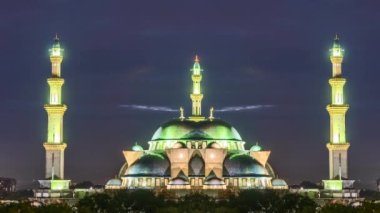 Kuala Lumpur, Malaysia - July 7, 2022 - Time lapse 4k uhd video of Mosque during cloudy sunrise
