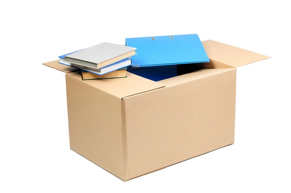 Cardboard box and books — Stock Photo, Image