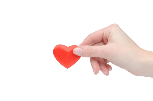 Cuore di San Valentino in una mano femminile isolata su sfondo bianco — Foto Stock