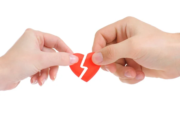 Broken heart in male and female hands isolated on white background — Stock Photo, Image