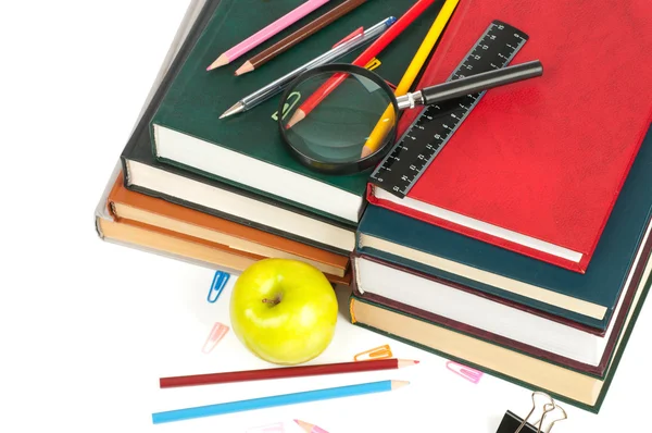 Book heap and color pencils isolated on white background — Stock Photo, Image