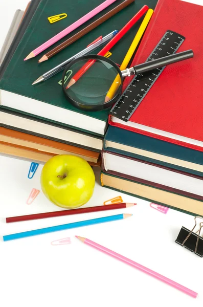 Book heap and color pencils isolated on white background — Stock Photo, Image