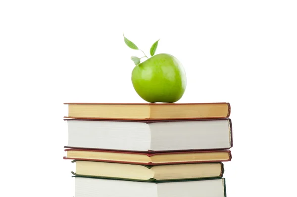 Book heap and apple — Stock Photo, Image