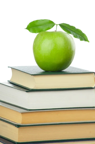 Book heap and apple — Stock Photo, Image