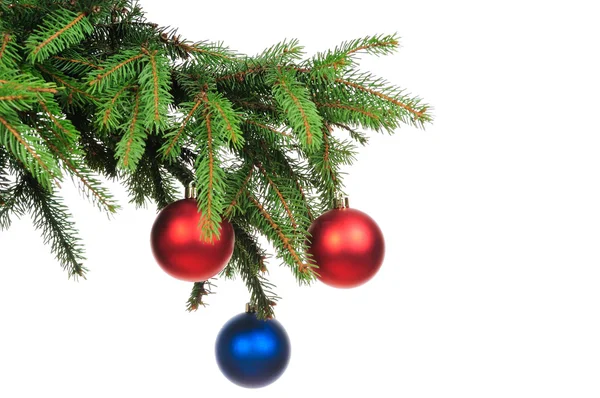 Pine branches and Christmas ornaments — Stock Photo, Image