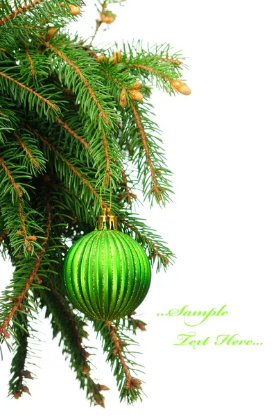 Pine branches and Christmas ornaments — Stock Photo, Image