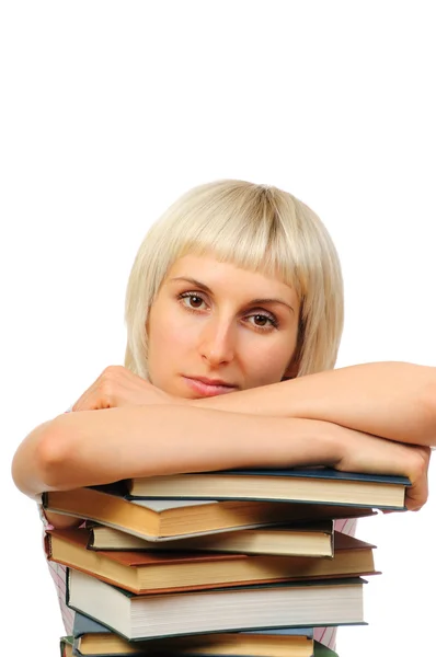 Mujer joven con montón de libros — Foto de Stock