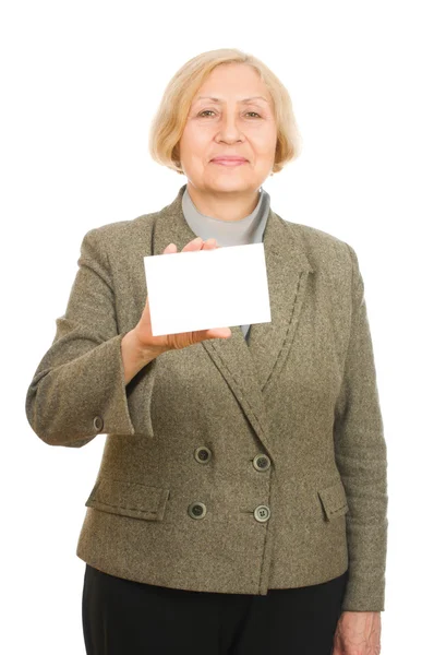 Portrait of a happy senior woman holding a blank sign — Stock Photo, Image