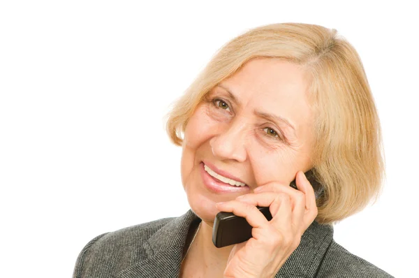 Šťastný starší žena pomocí mobilního telefonu — Stock fotografie