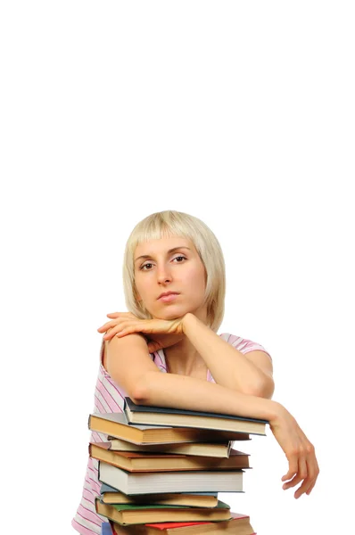 Young woman with book heap — Stock Photo, Image
