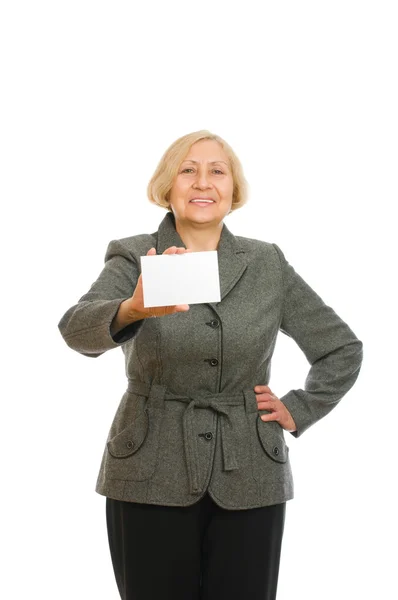 Portrait of a happy senior woman holding a blank sign — Stock Photo, Image