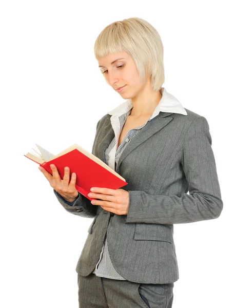 Businesswoman reading book isolated on white background — Stock Photo, Image