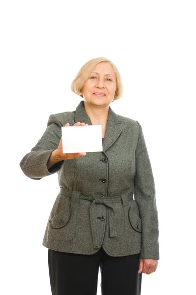 Portrait of a happy senior woman holding a blank sign — Stock Photo, Image