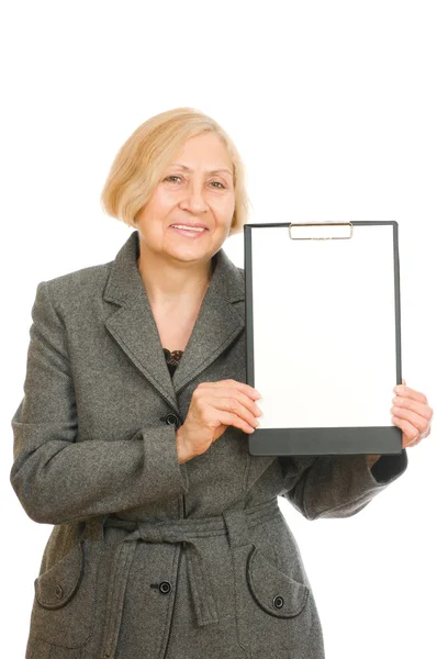 Senior woman holding a clipboard — Stock Photo, Image