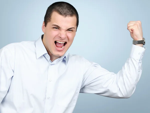 Geschäftsmann zeigt seinen Bizeps — Stockfoto