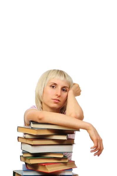 Mujer joven con montón de libros — Foto de Stock