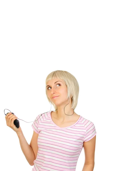 Uma bela menina ouvindo música em seu jogador isolado no fundo branco — Fotografia de Stock