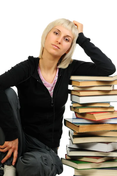 Young woman with book heap — Stock Photo, Image