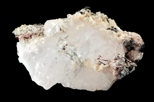 Calcyte mineral na białym tle na czarnym tle — Zdjęcie stockowe