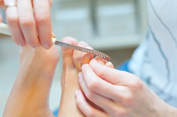 Pedicure in process.shallow diepte van het veld — Stockfoto