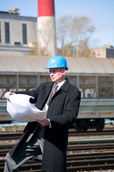 Engineer with drawing — Stock Photo, Image