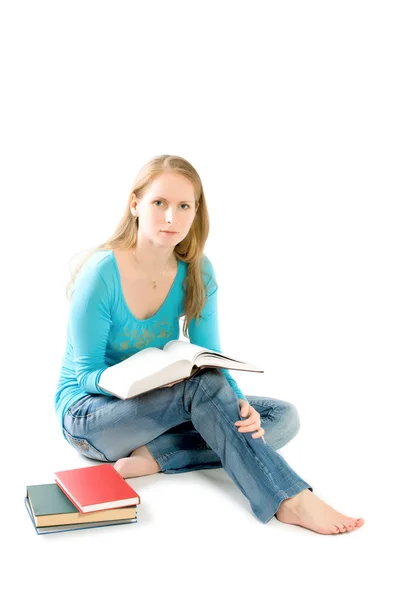 Giovane ragazza con libri isolati su bianco — Foto Stock