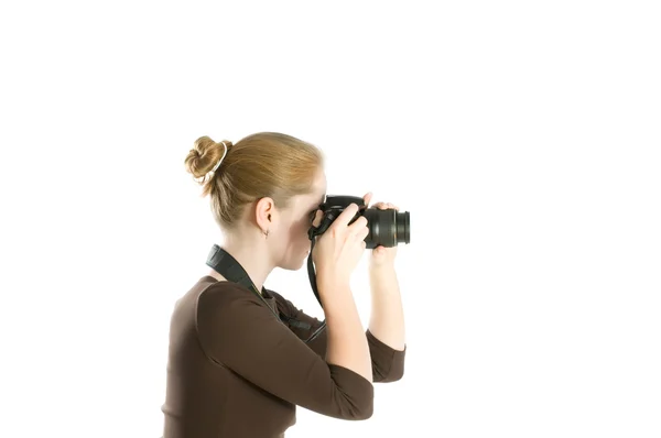 Mulher segurando uma câmera fotográfica — Fotografia de Stock