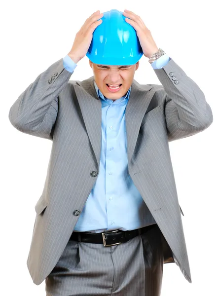 Sad engineer in blue hard hat — Stock Photo, Image