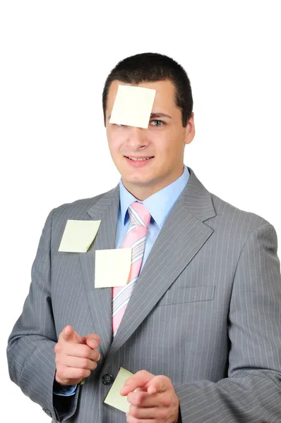 Portret van een jonge man met stickers geïsoleerd op witte achtergrond — Stockfoto