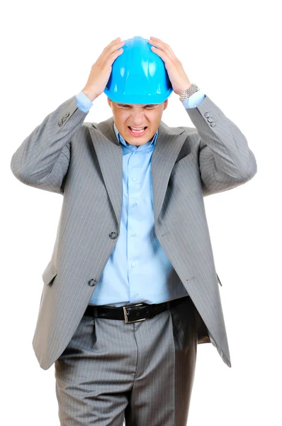 Sad engineer in blue hard hat — Stock Photo, Image