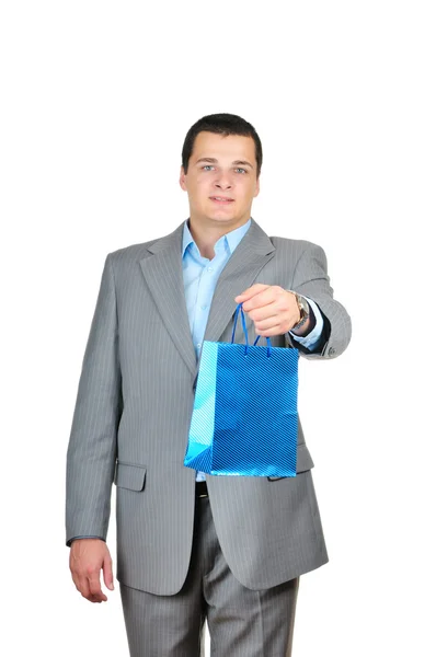 Businessman giving bag — Stock Photo, Image